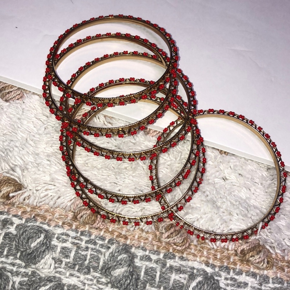 Red and gold beaded bracelets